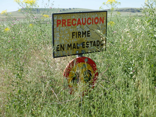 Caution - The Earth [road] is Unstable.
